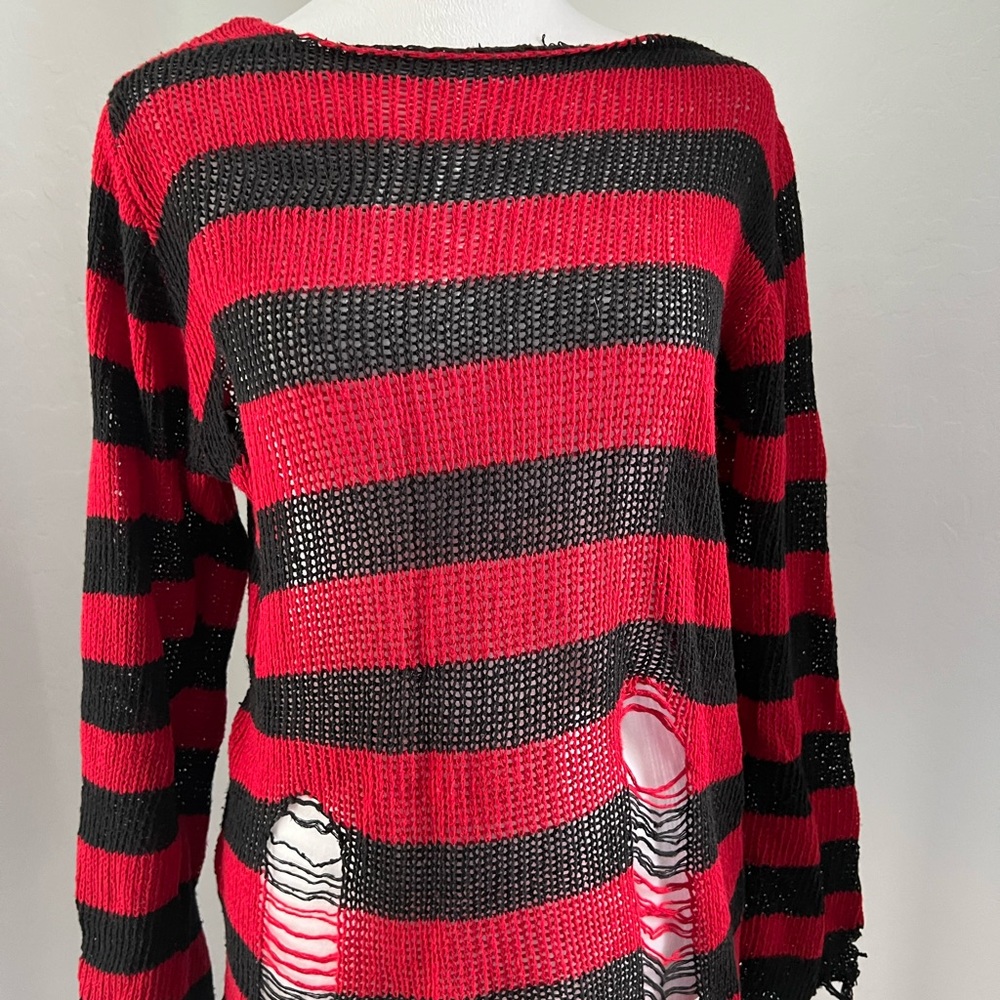 Intentionally frayed knit red and black sweater, size large